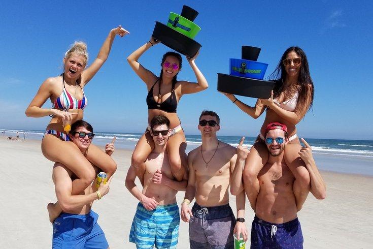 people playing beach games