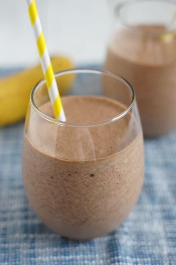 Banana Nutella Milkshake being poured into a glass