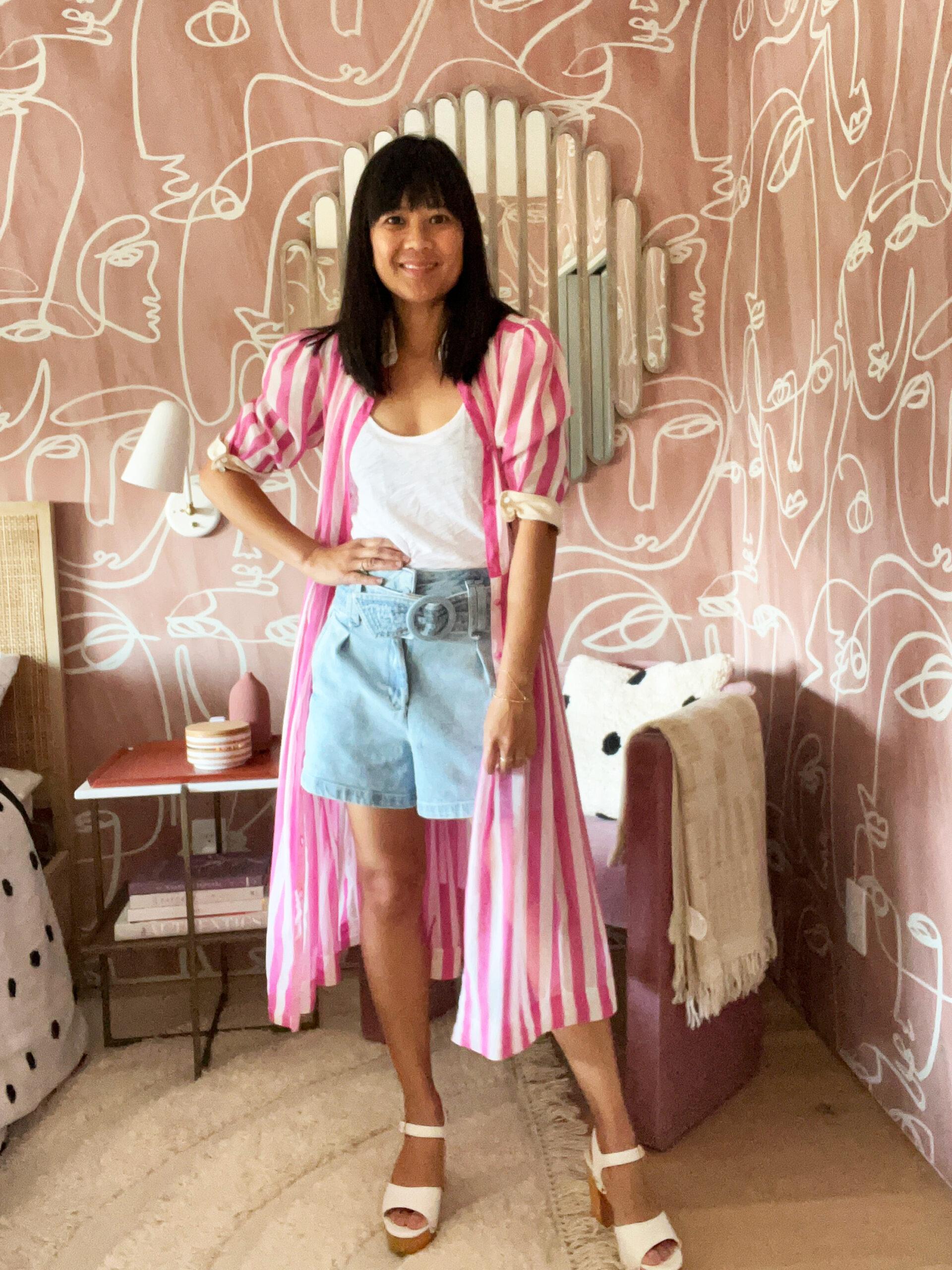 woman layering vintage and streetwear clothing