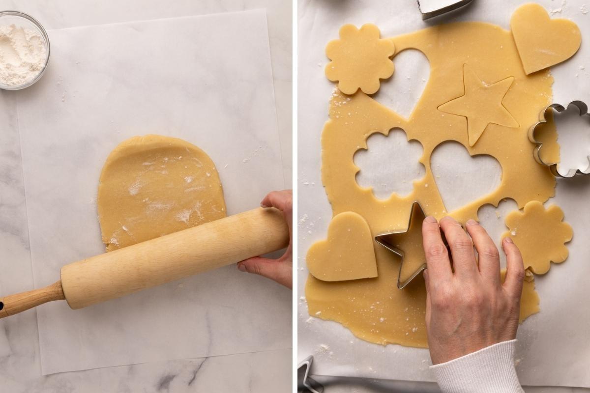 hands rolling out sugar cookie dough with cookie cutters scattered around