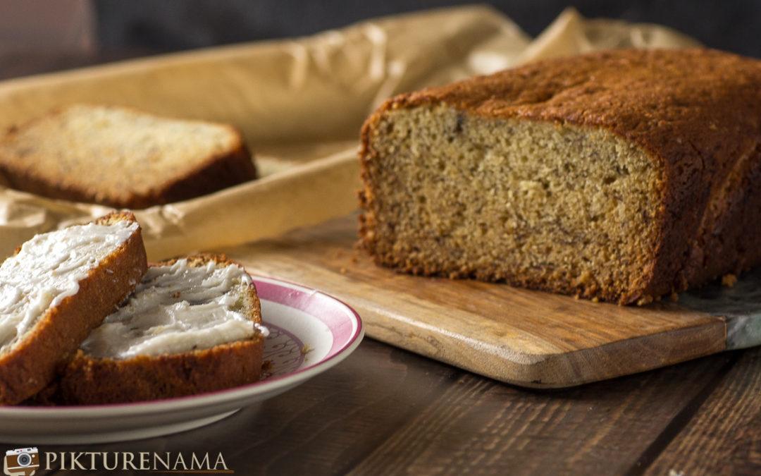 sliced banana maple butter bread on a wooden cutting board