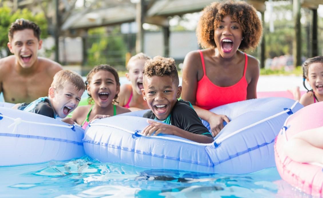 family having fun at a safe pool party