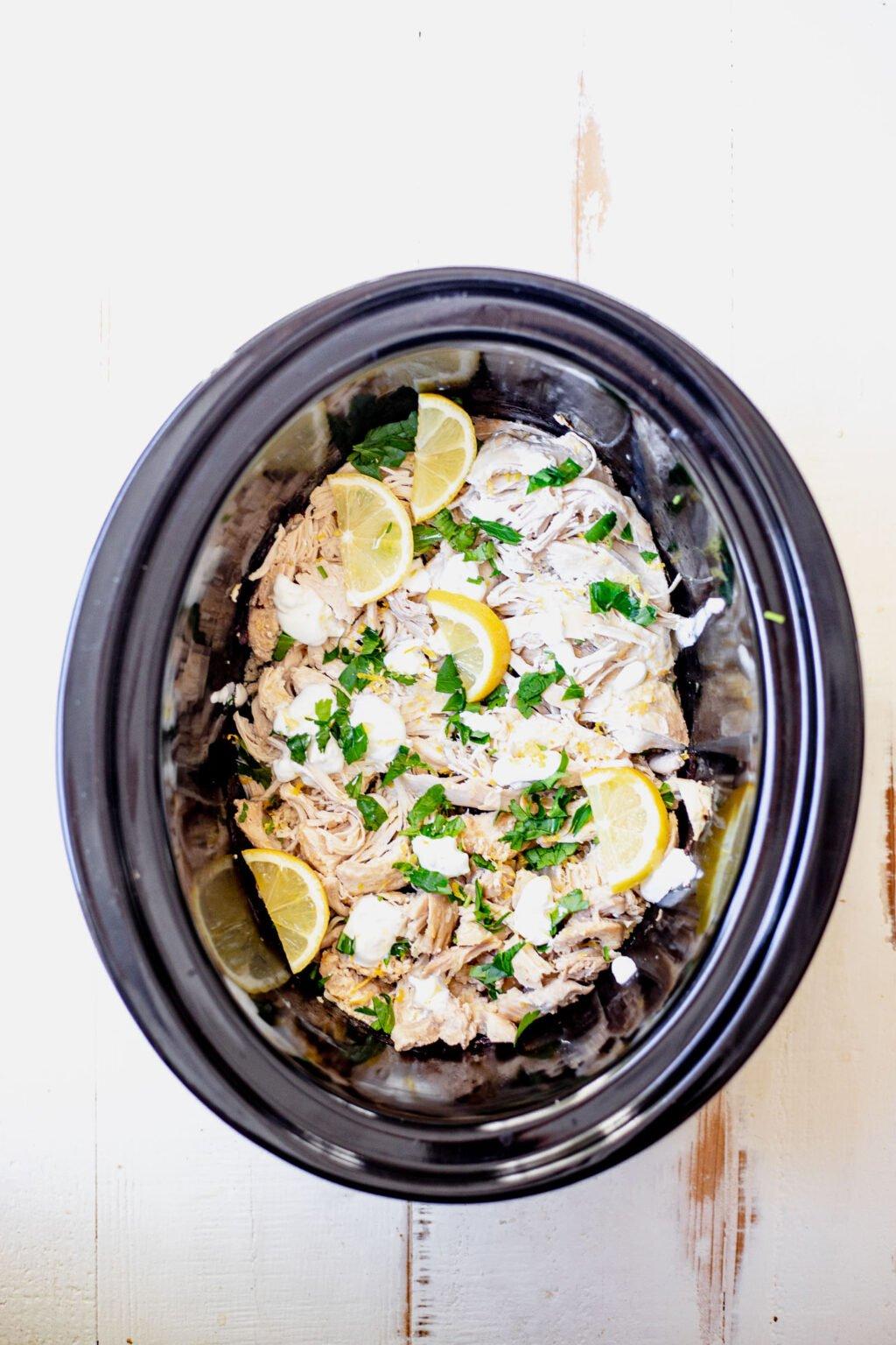 overhead shot of a serving of slow cooker lemon herb chicken and rice