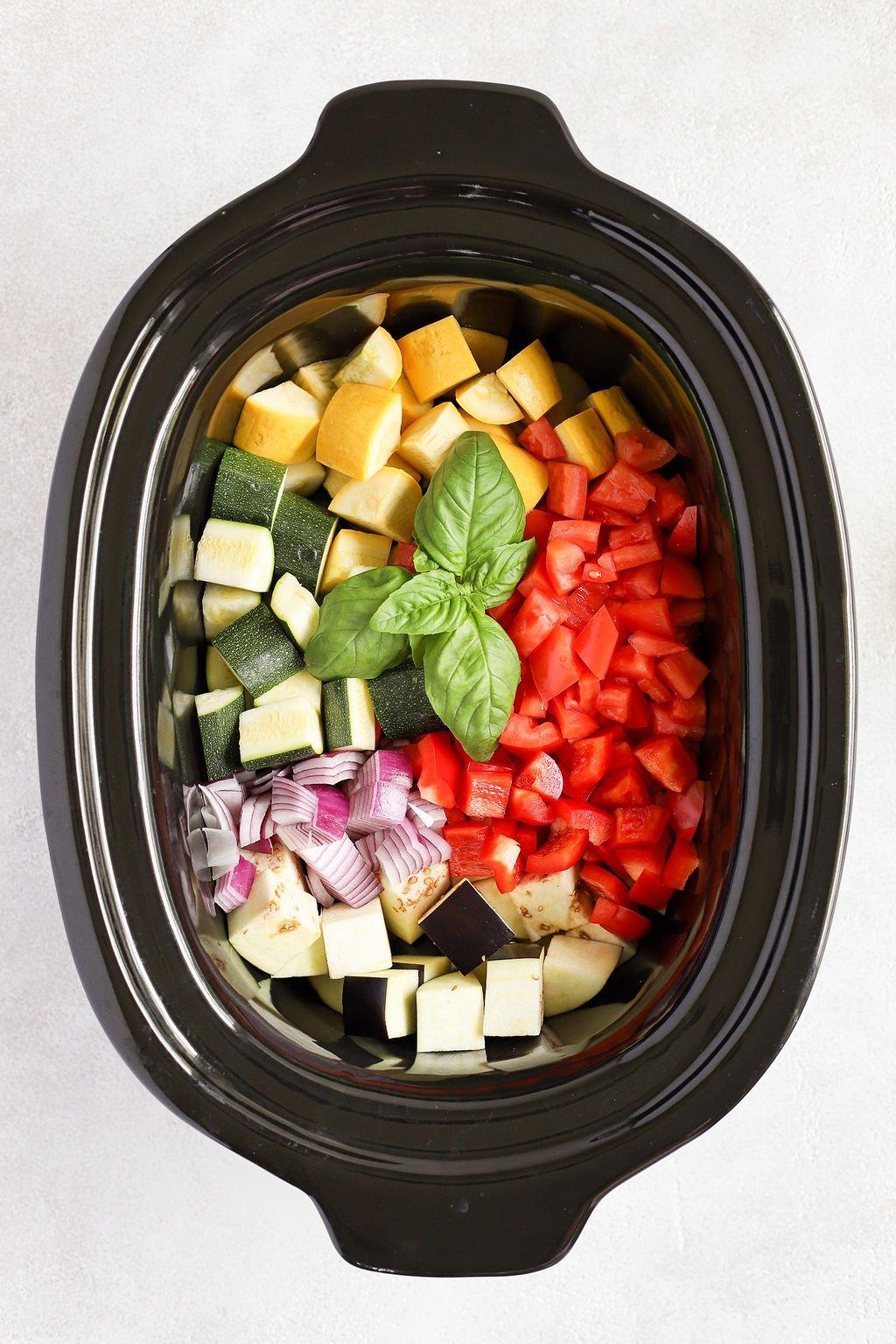 Overhead shot of colorful chopped vegetables ready for a slow cooker