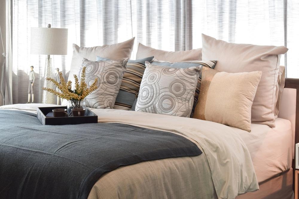 Variety of pillows on a bed