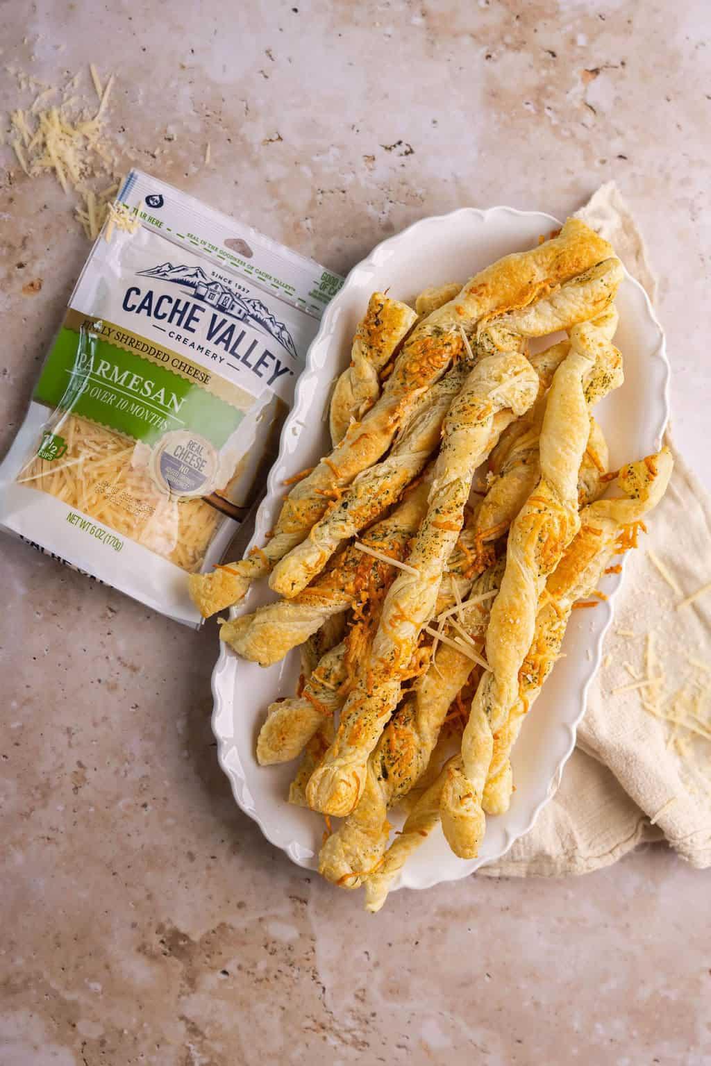 ingredients for savory puff pastry twists on a wooden board