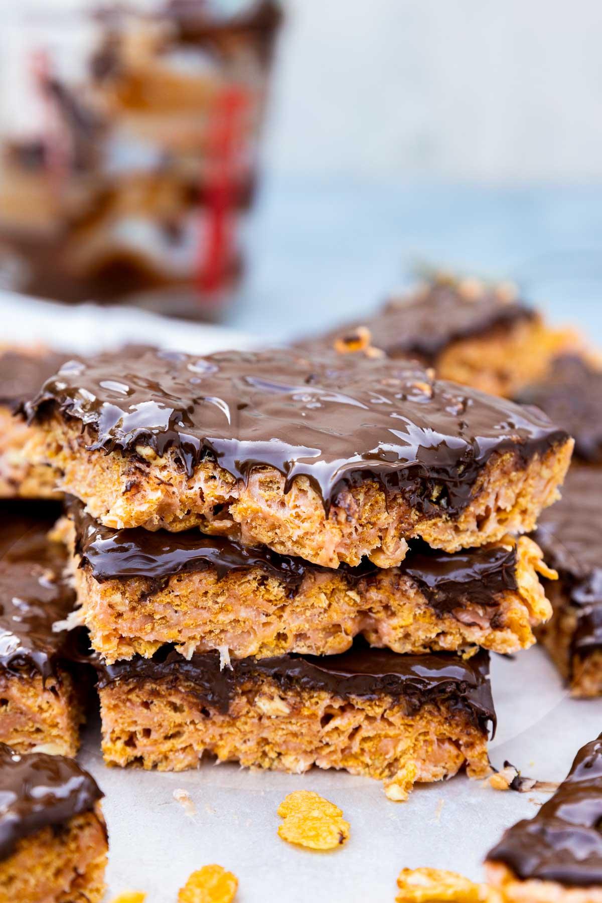 Close-up shot of a slice of rhubarb peanut butter chocolate bar showing the layers
