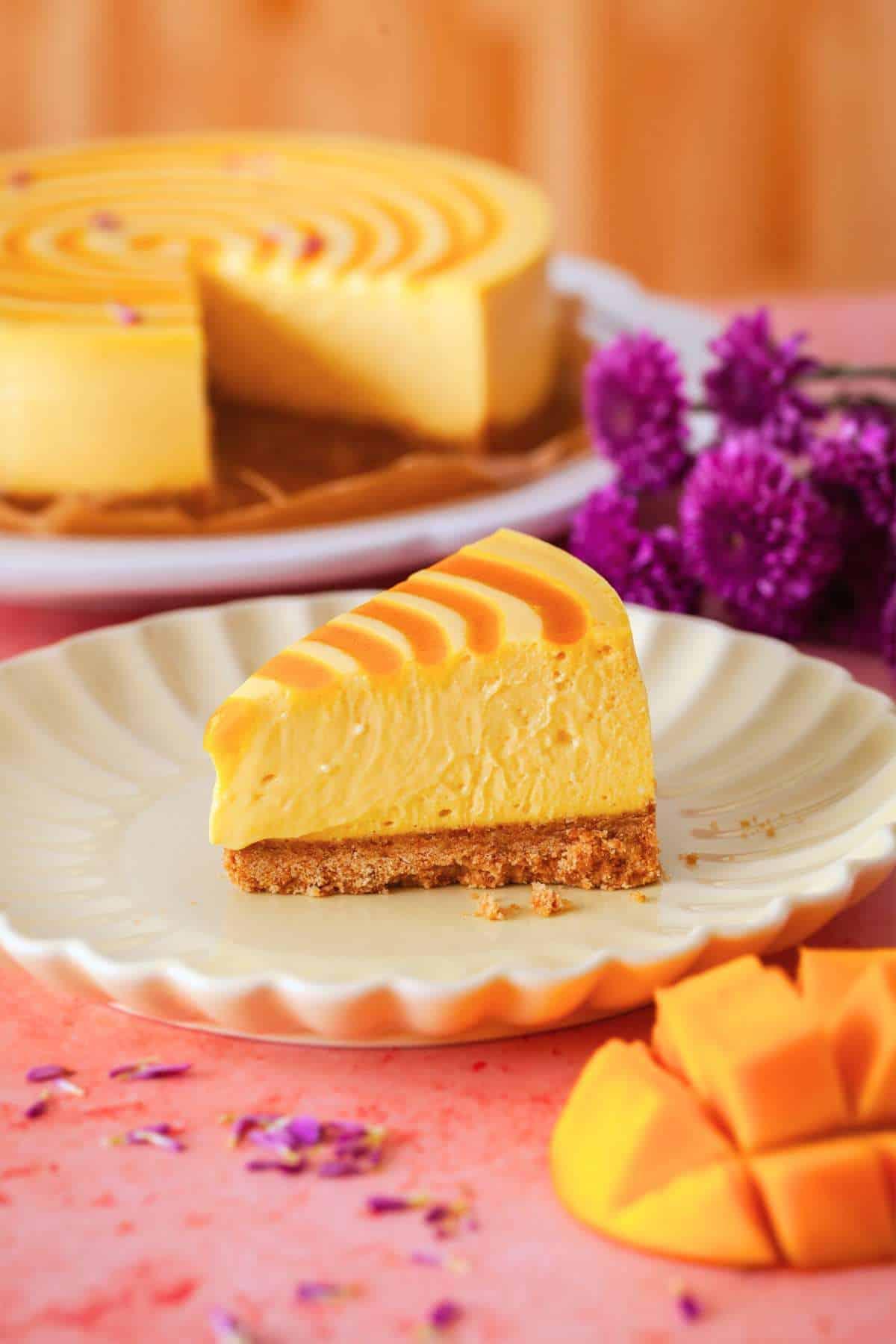 close up of a slice of Spicy Mango Habanero Cheesecake on a plate