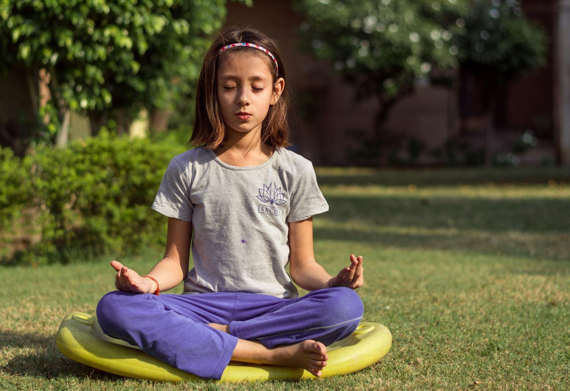 student meditating