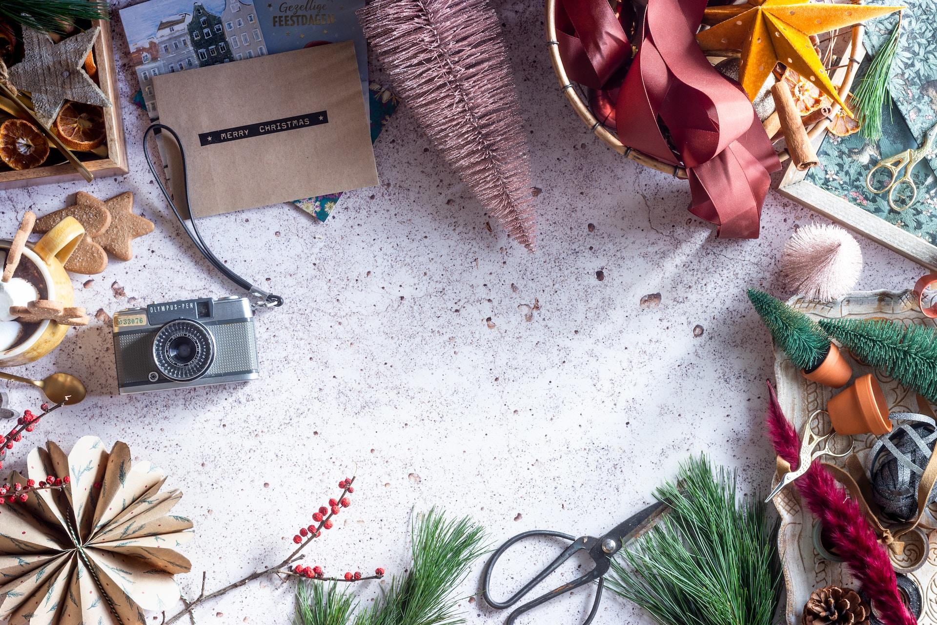 Variety of Christmas craft kits laid out on a table