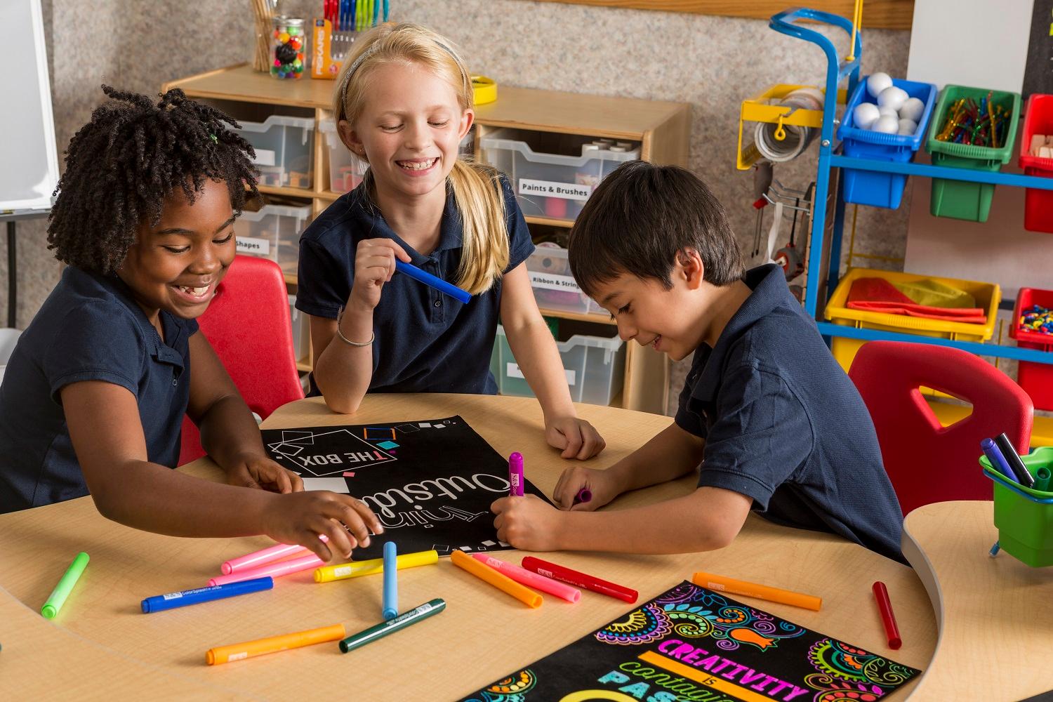 diverse group of children working on different art projects