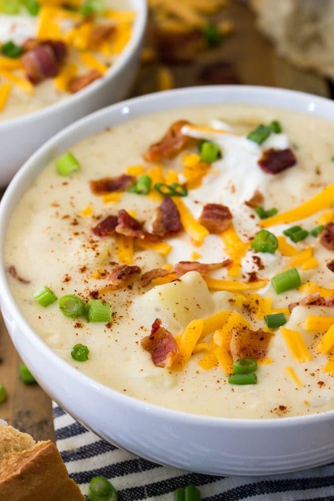 close-up of creamy potato soup with cheese and bacon