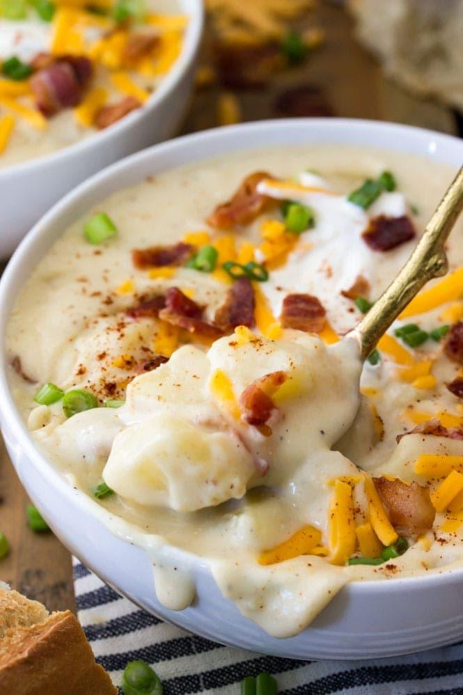 Ingredients for creamy potato soup: potatoes, bacon, cheese, broth