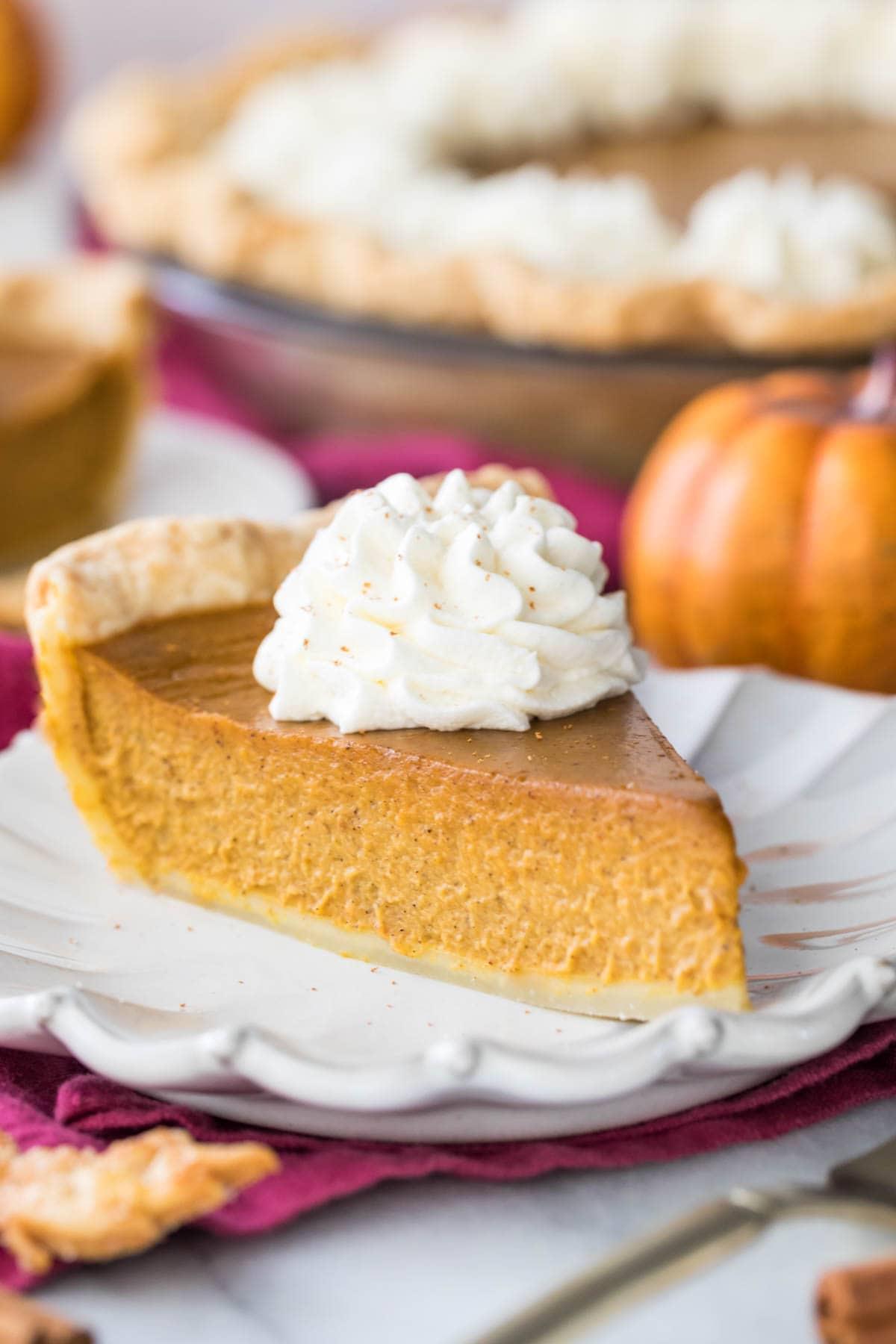 creamy texture of vanilla pumpkin pie filling being poured into a crust