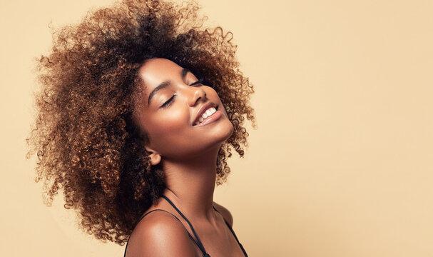 woman with beautiful, healthy curly hair