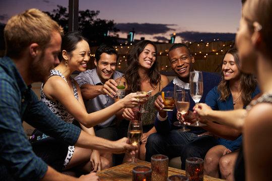 People partying on a rooftop bar