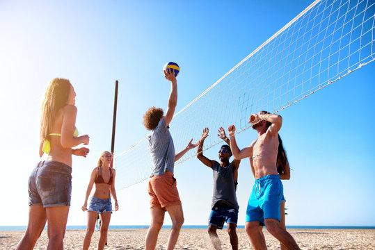 people playing beach volleyball
