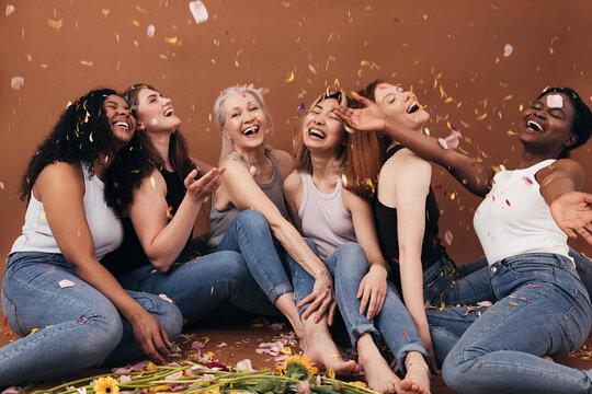 group of diverse women laughing together