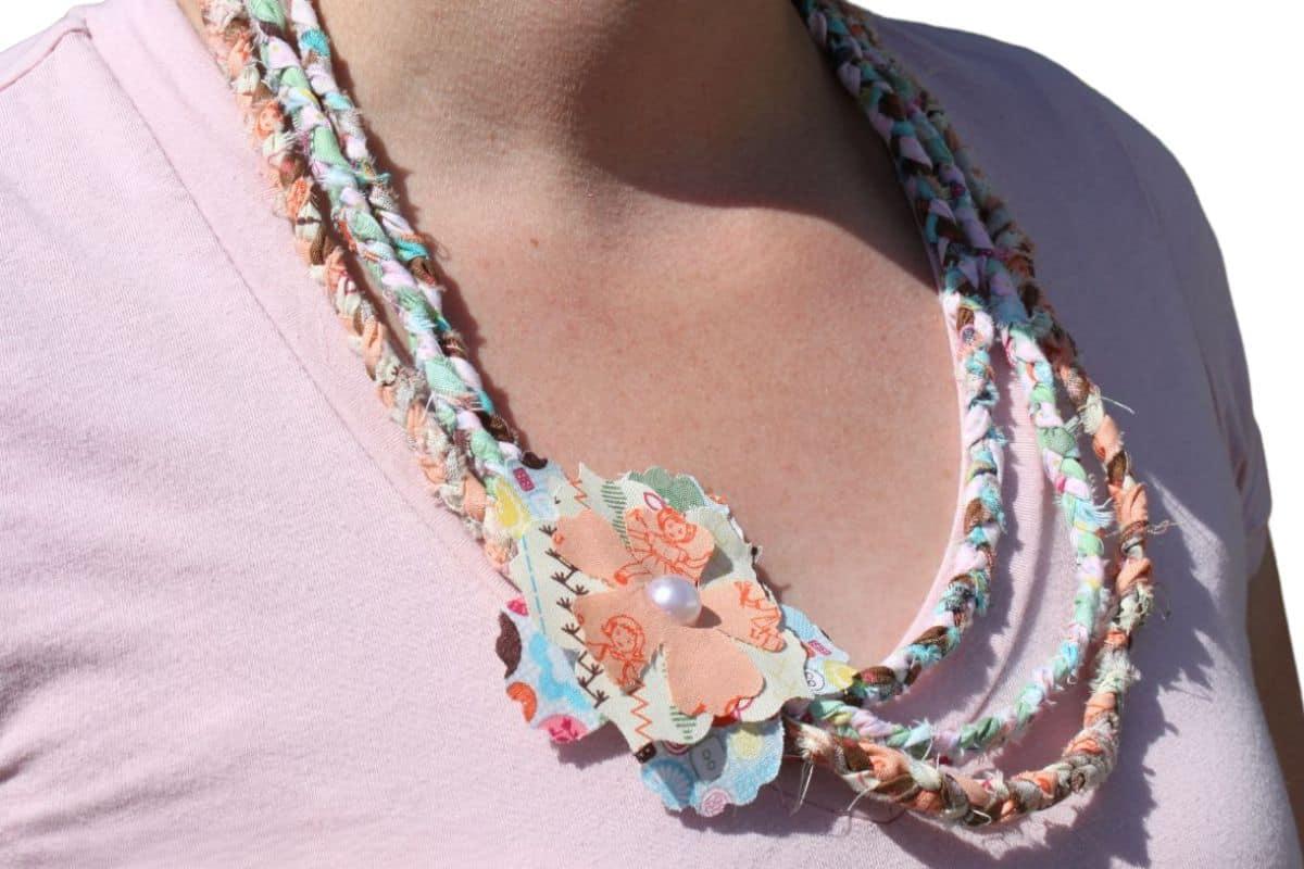 close-up of layered necklaces and fabrics