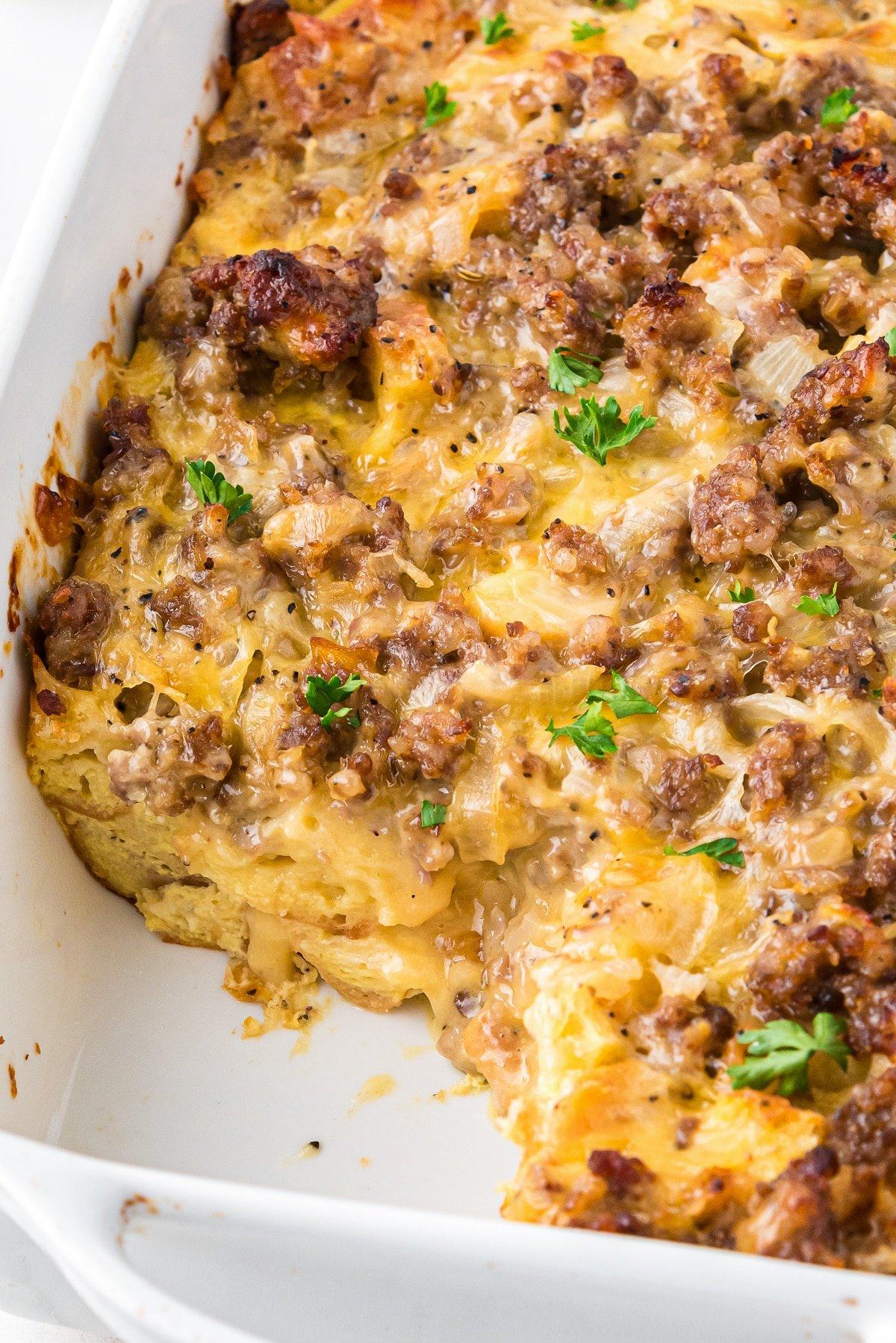 Close-up shot of golden-brown breakfast casserole with melted cheese