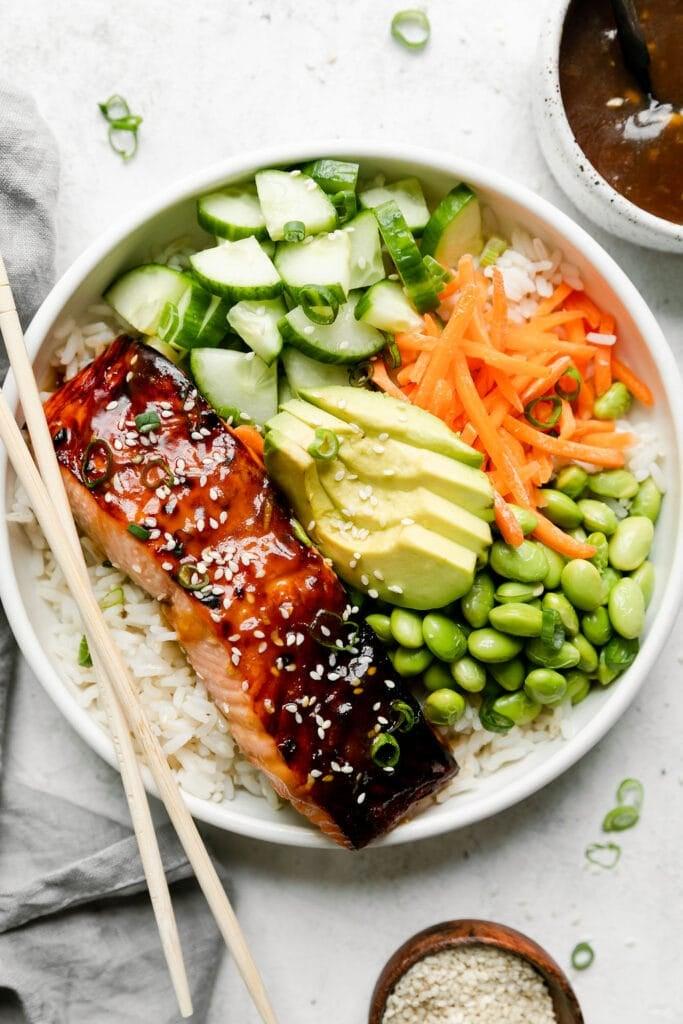 Close-up shot of the spicy salmon and avocado mixture in the bento box, highlighting the textures and colors