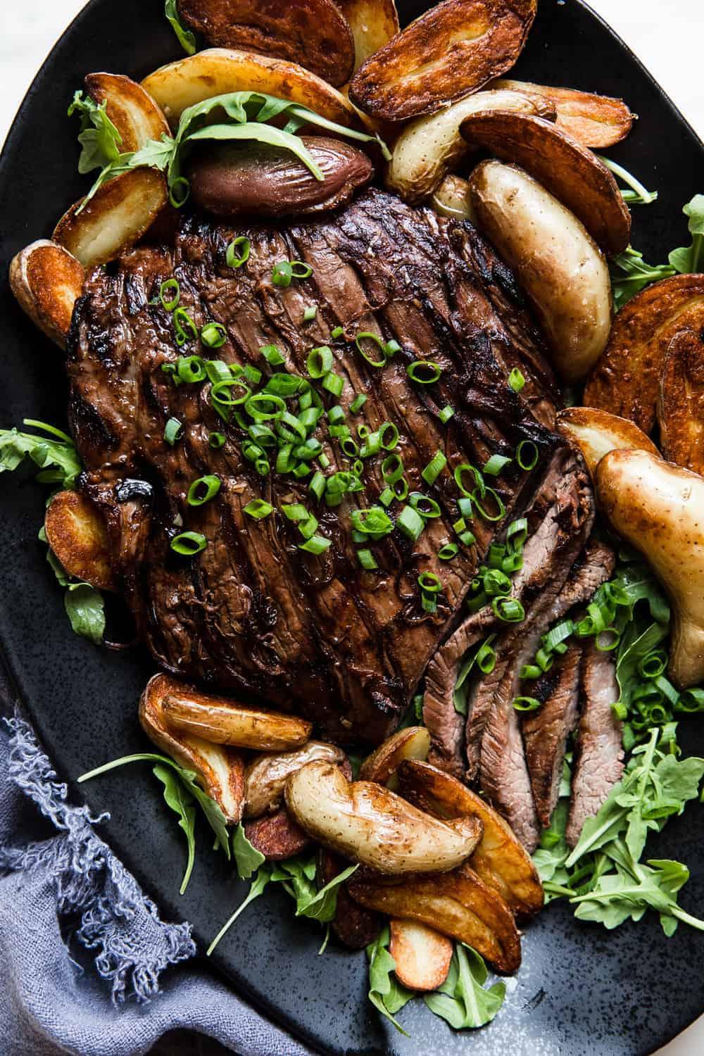 Grilled Brown Sugar Garlic Flank Steak on a Cutting Board