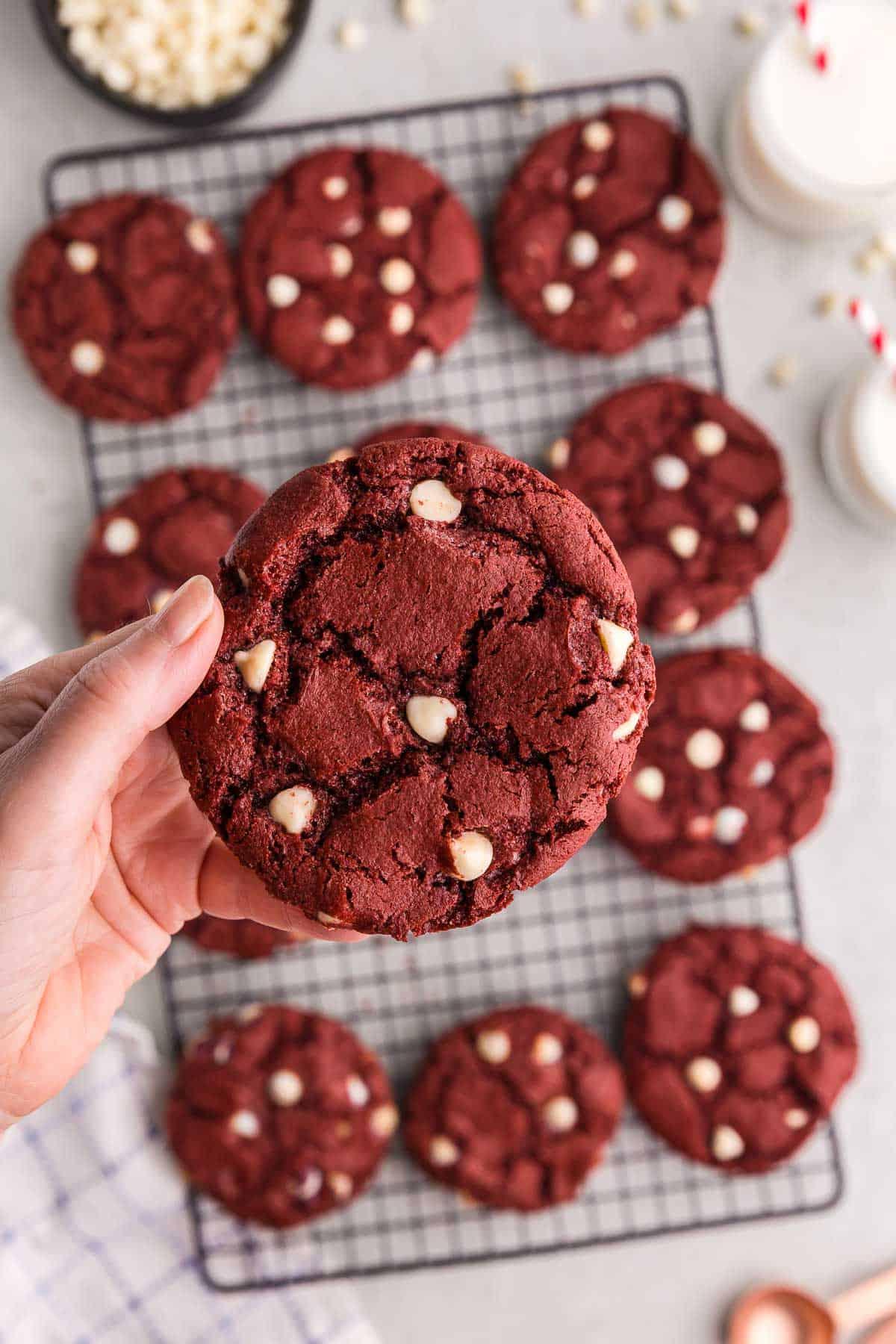 Close-up of vibrant red velvet swirl cookies on a cooling rack
