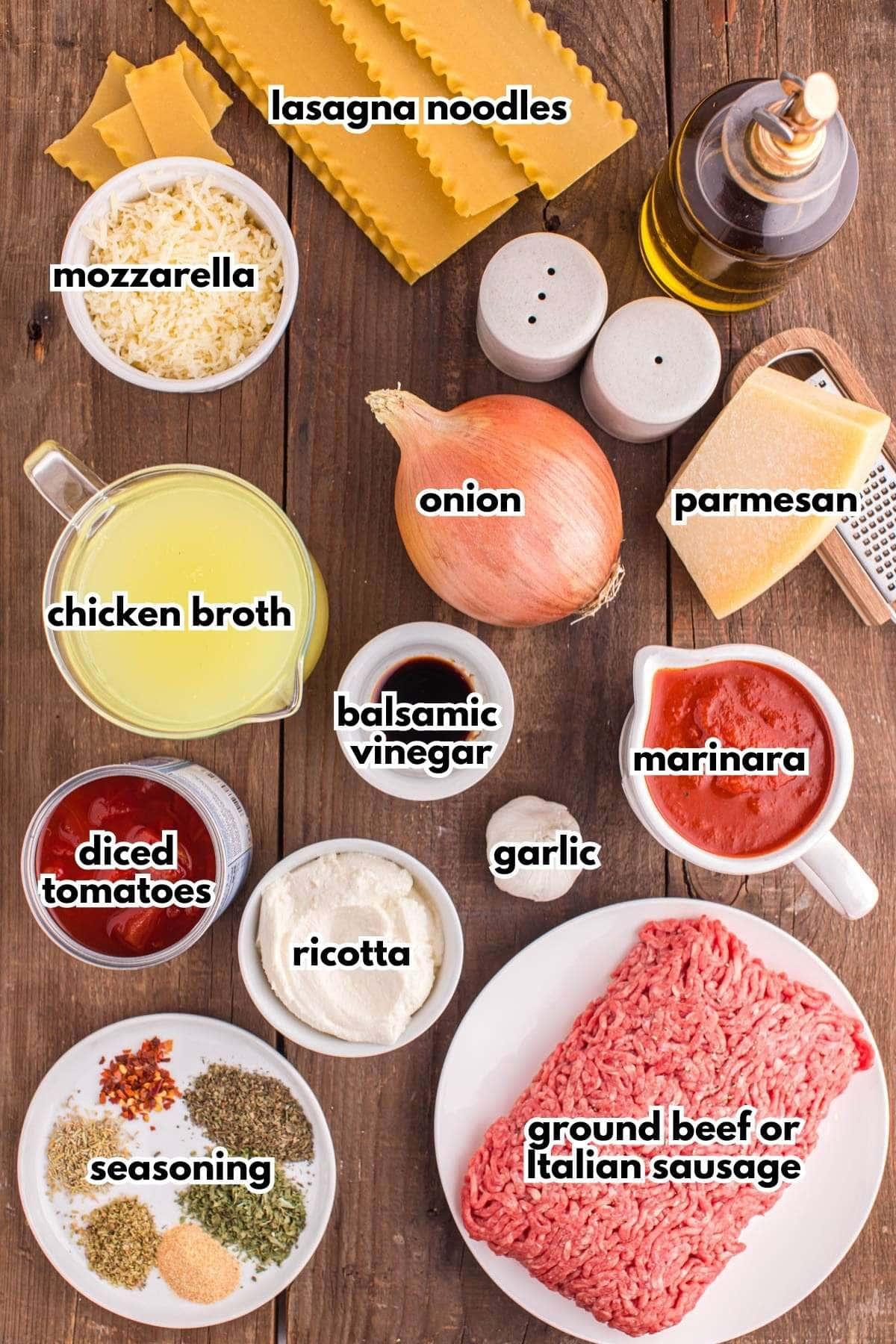 ingredients for lasagna soup on a wooden table