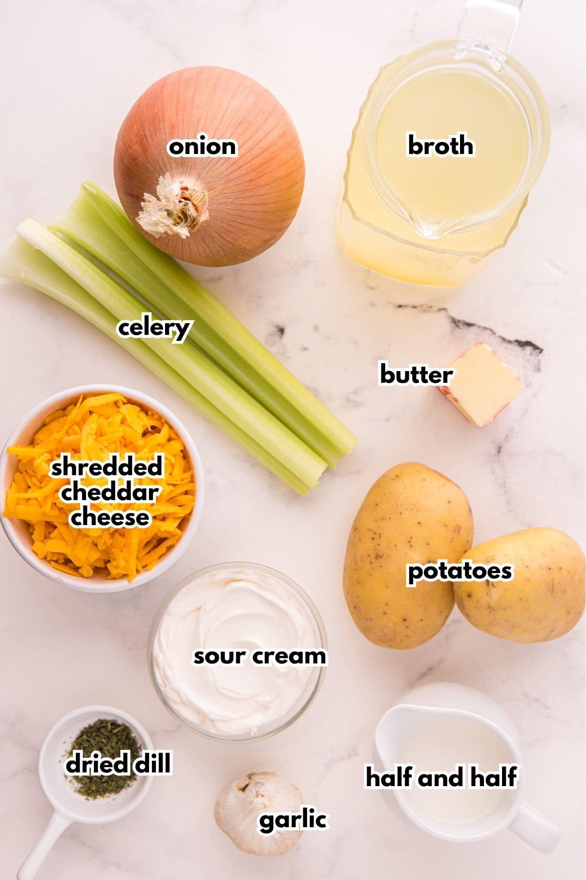 Ingredients for potato soup laid out on a wooden countertop