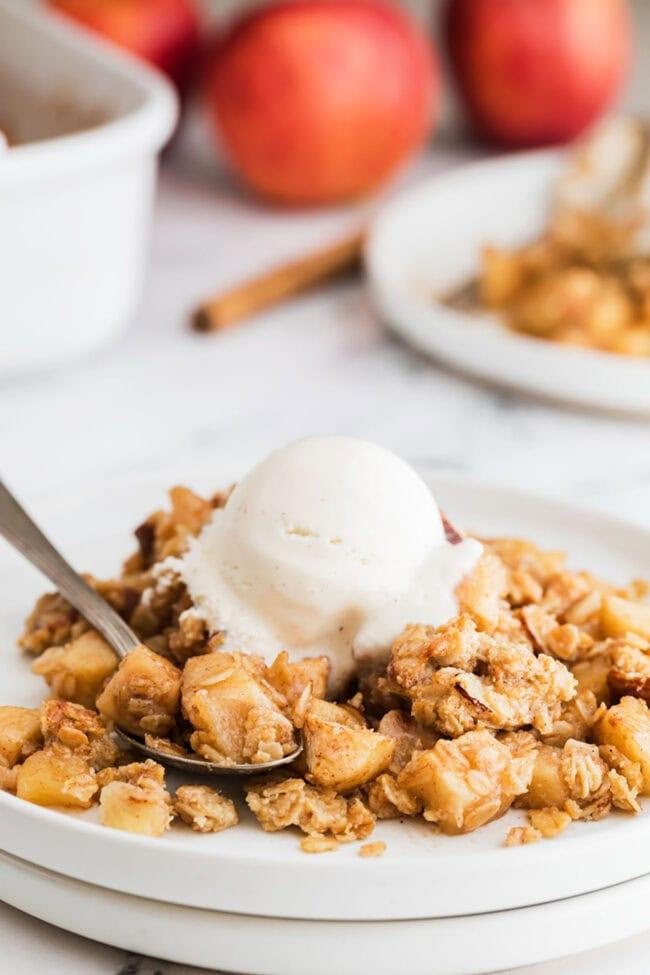 Oatmeal apple crisp with a scoop of vanilla ice cream