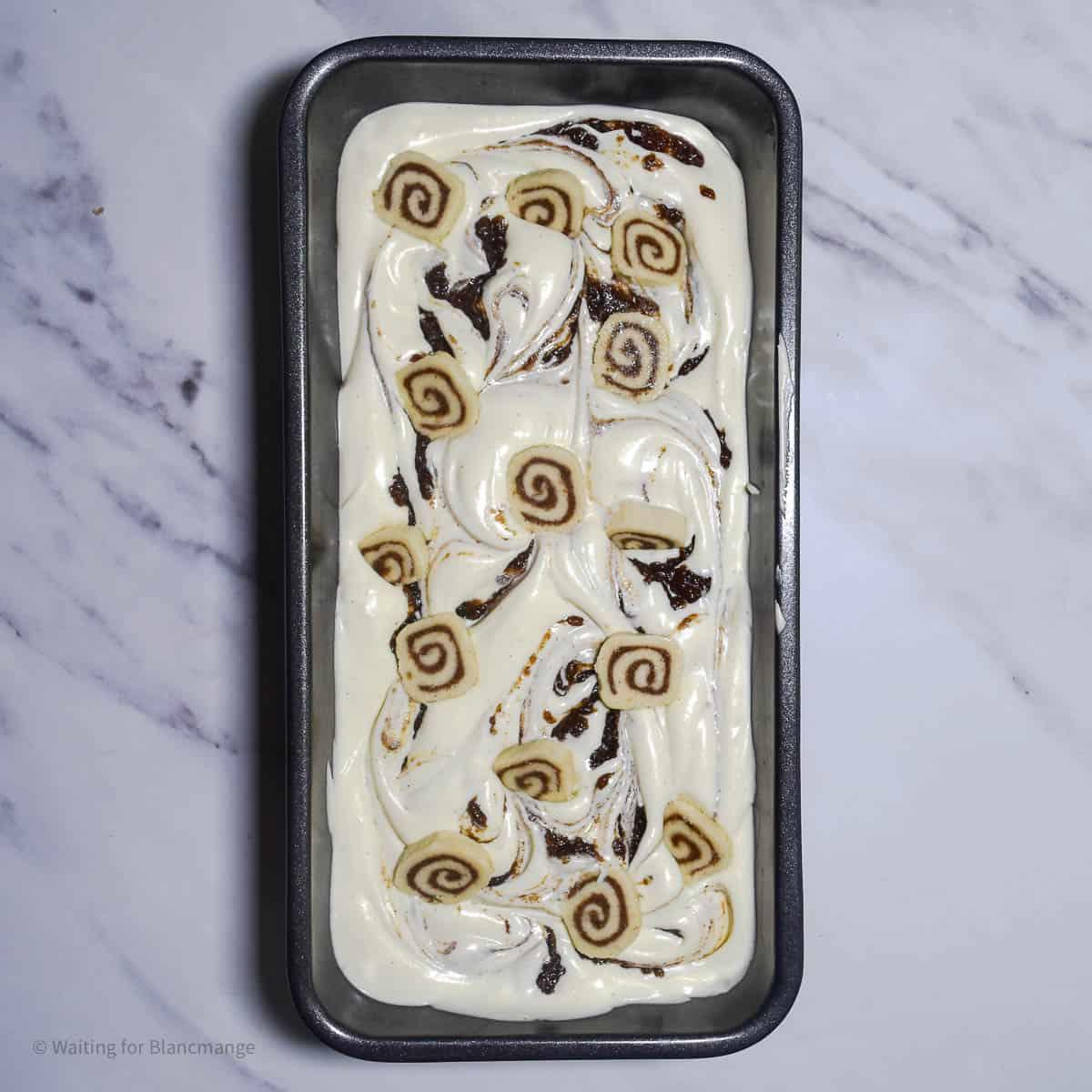 overhead shot of cinnamon swirl cookie dough in a baking pan
