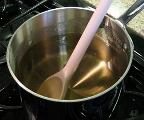 homemade simple syrup being made on a stove