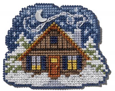 Close-up shot of 'Cozy Cabin' Cross-Stitch Kit