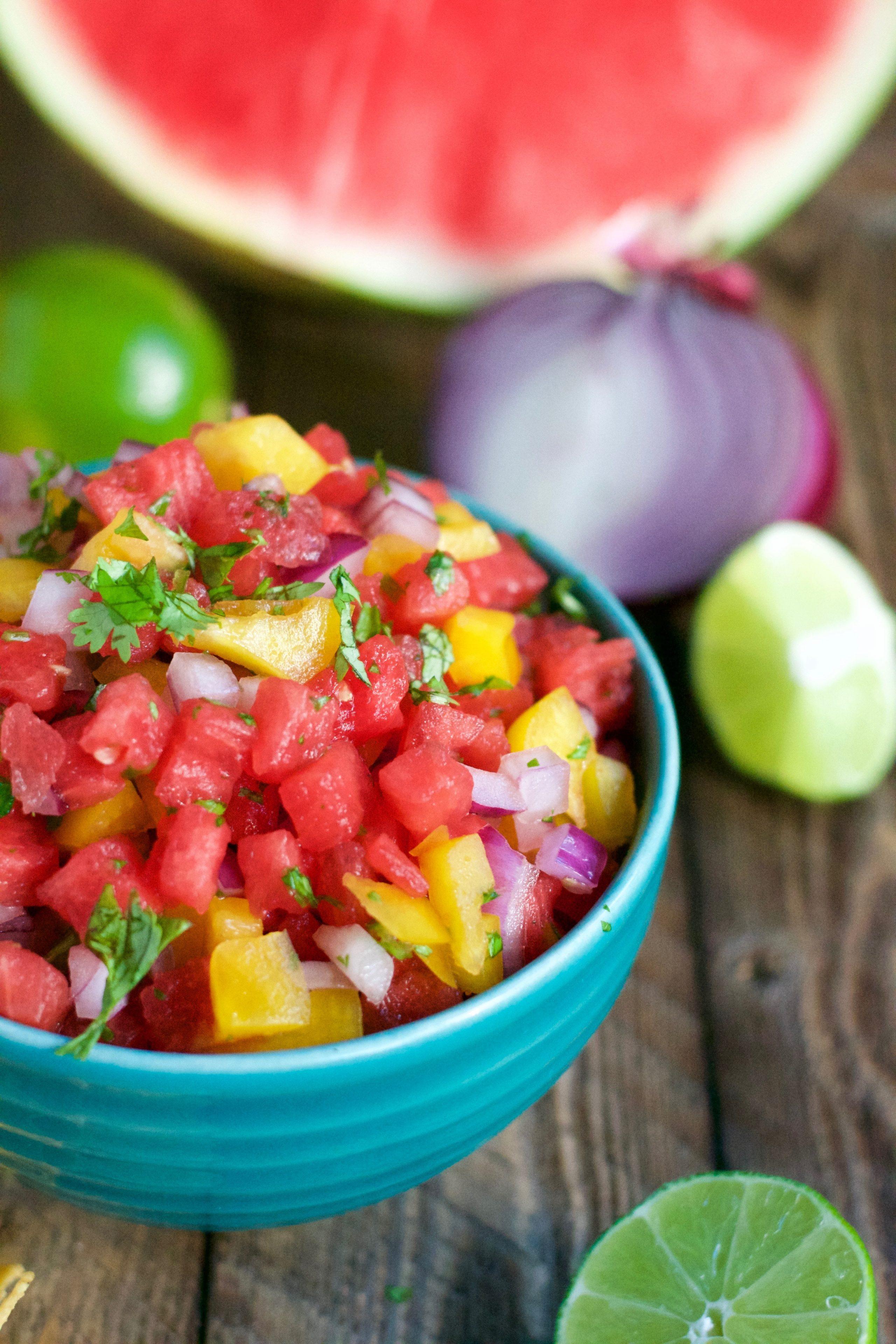 ingredients for watermelon jalapeno salsa on a wooden table