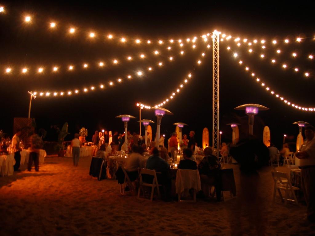 string lights on the beach at night