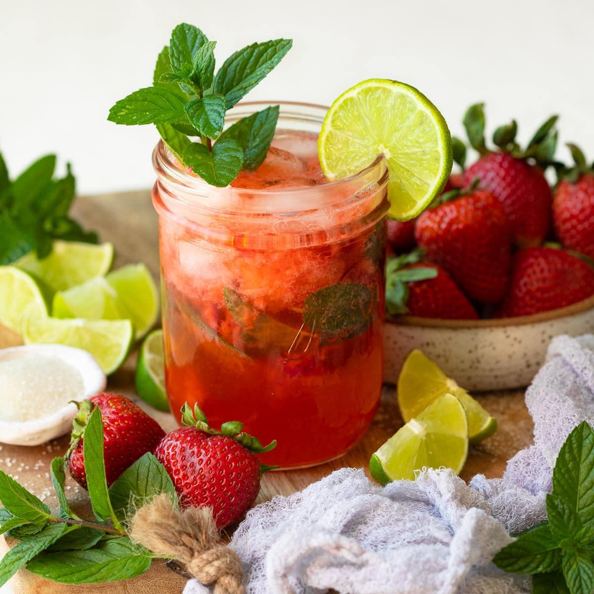 ingredients for strawberry mint mojito mousse on a kitchen counter