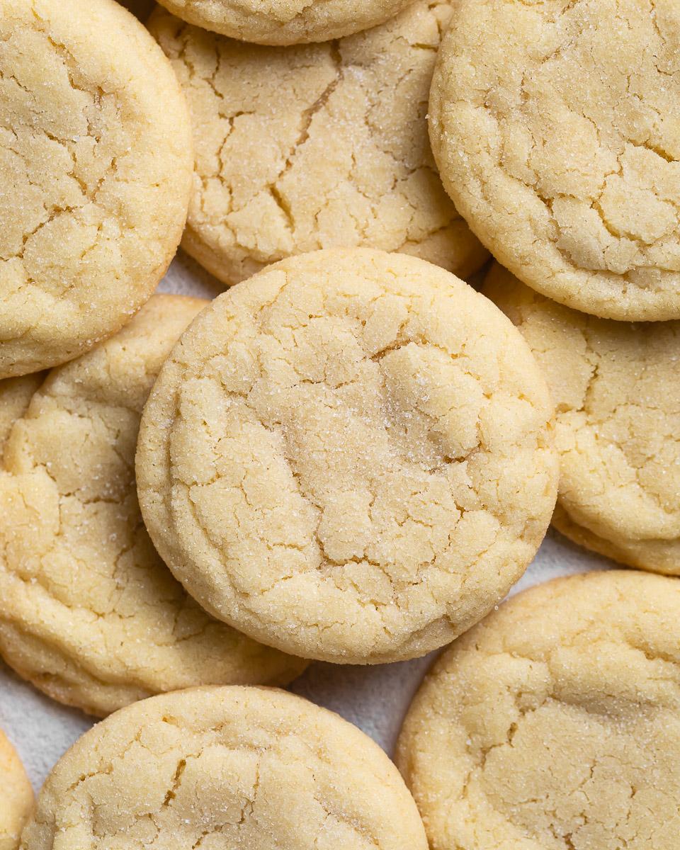 close-up of a stack of sugar cookies showing the soft, chewy texture