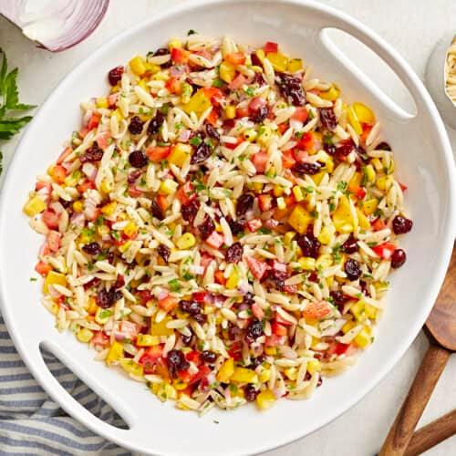 Overhead shot of the Orzo Pasta Salad, presented beautifully on a platter