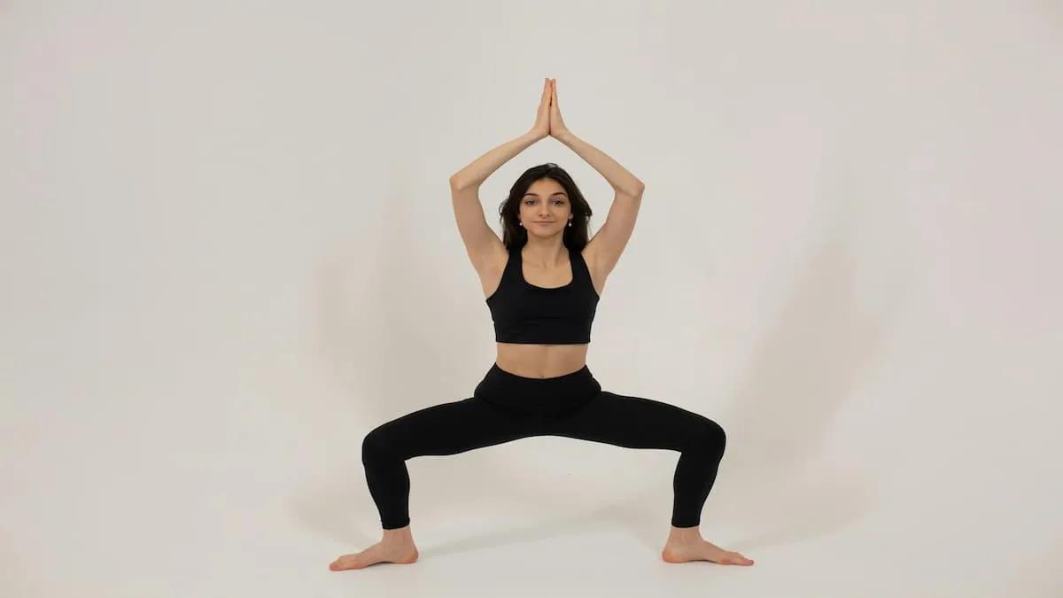 woman successfully completing a yoga pose