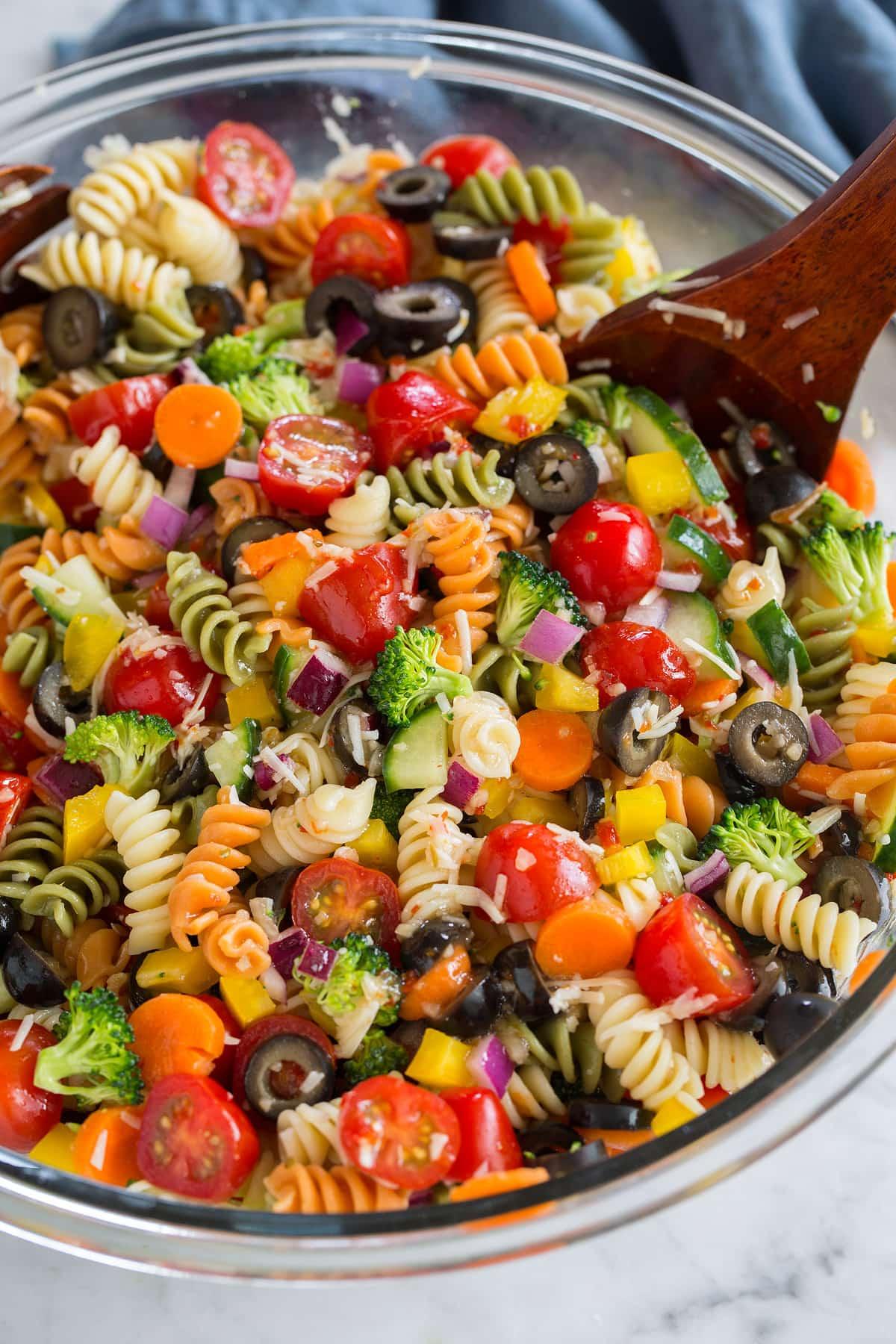 A delicious pasta salad with vibrant vegetables and a homemade dressing