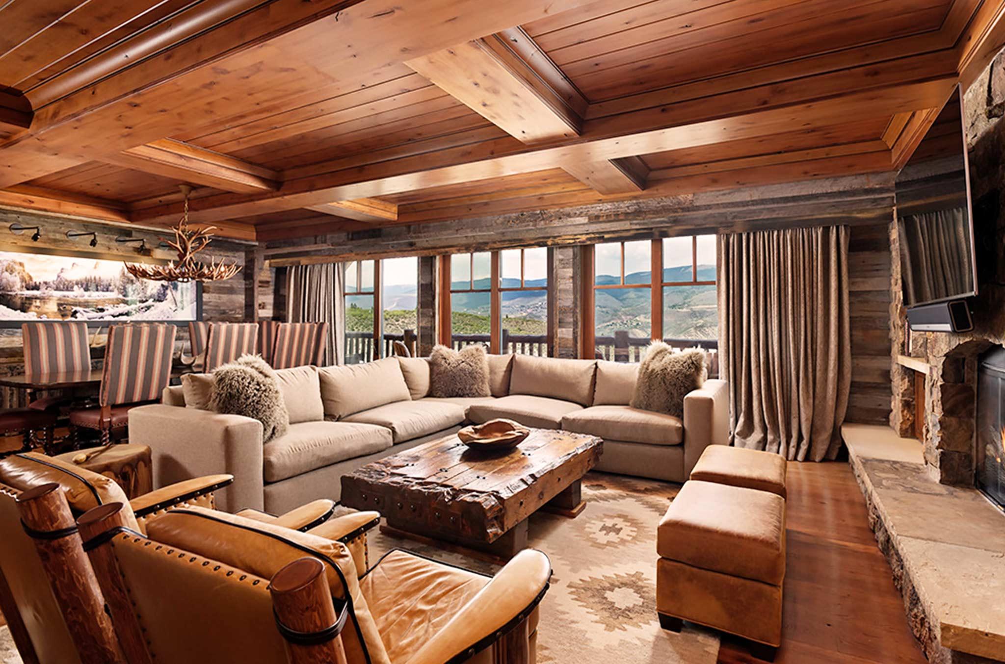 Ritz-Carlton Bachelor Gulch exterior and luxurious room interior with fireplace