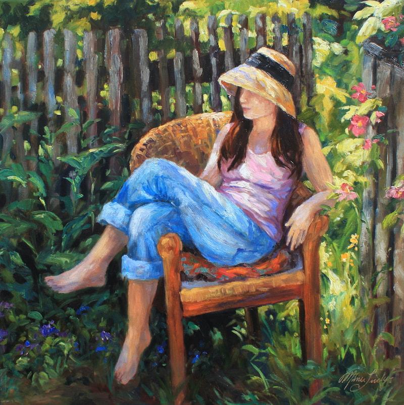 woman sitting peacefully in a garden