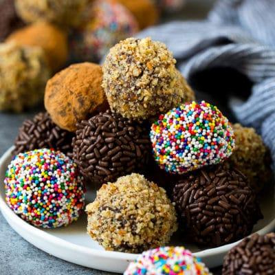 Various espresso truffles coated in different toppings, including cocoa, sprinkles, and nuts
