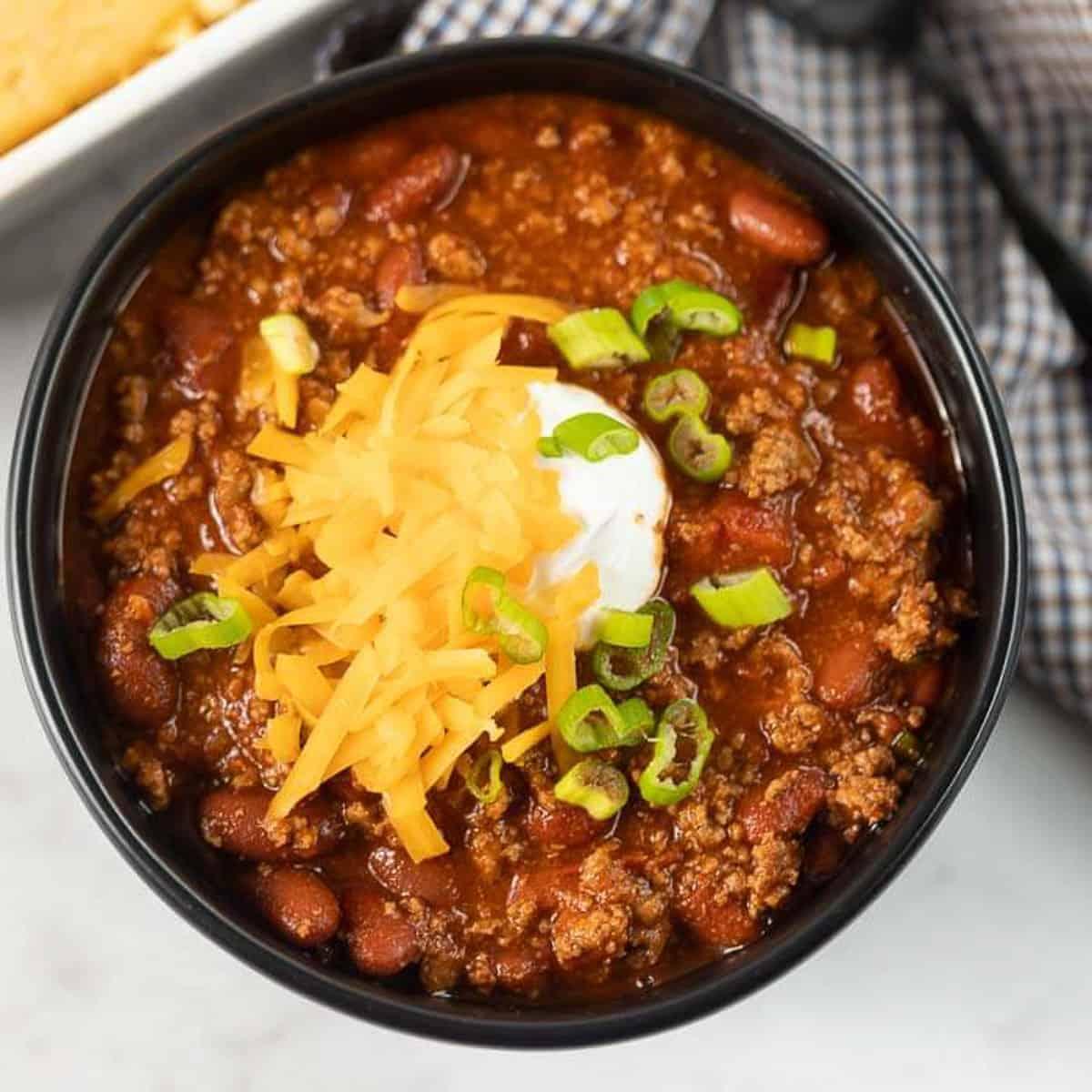 Close-up of chili simmering in a slow cooker