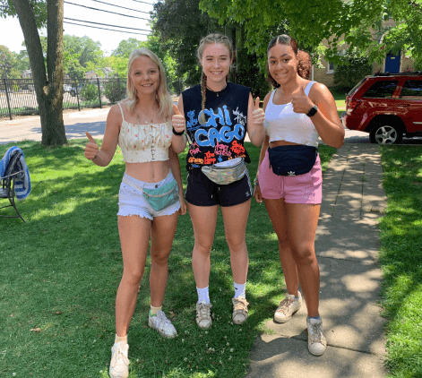 woman wearing fanny pack at music festival