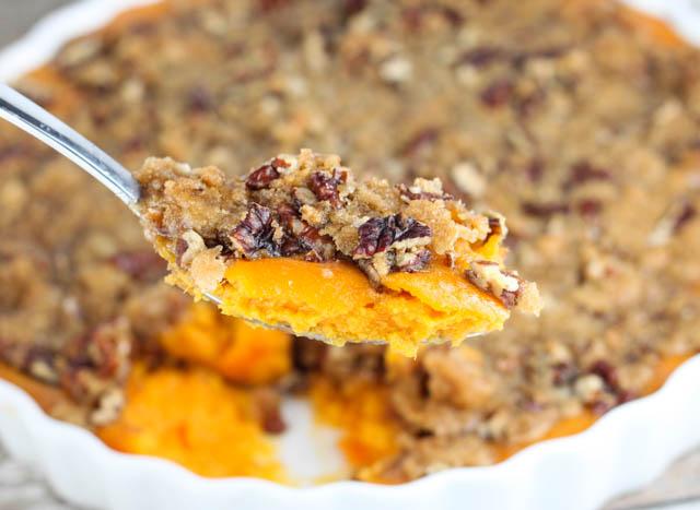 sweet potato casserole being served at a family gathering