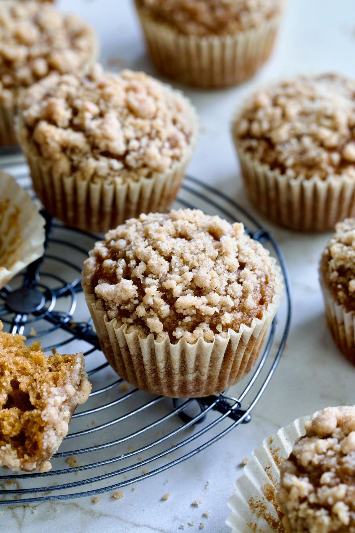 Ingredients for pumpkin streusel muffins arranged on a kitchen counter