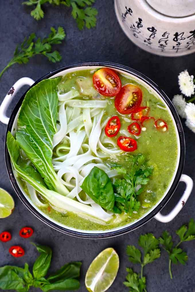 overhead shot of Thai green curry with noodles and vegetables