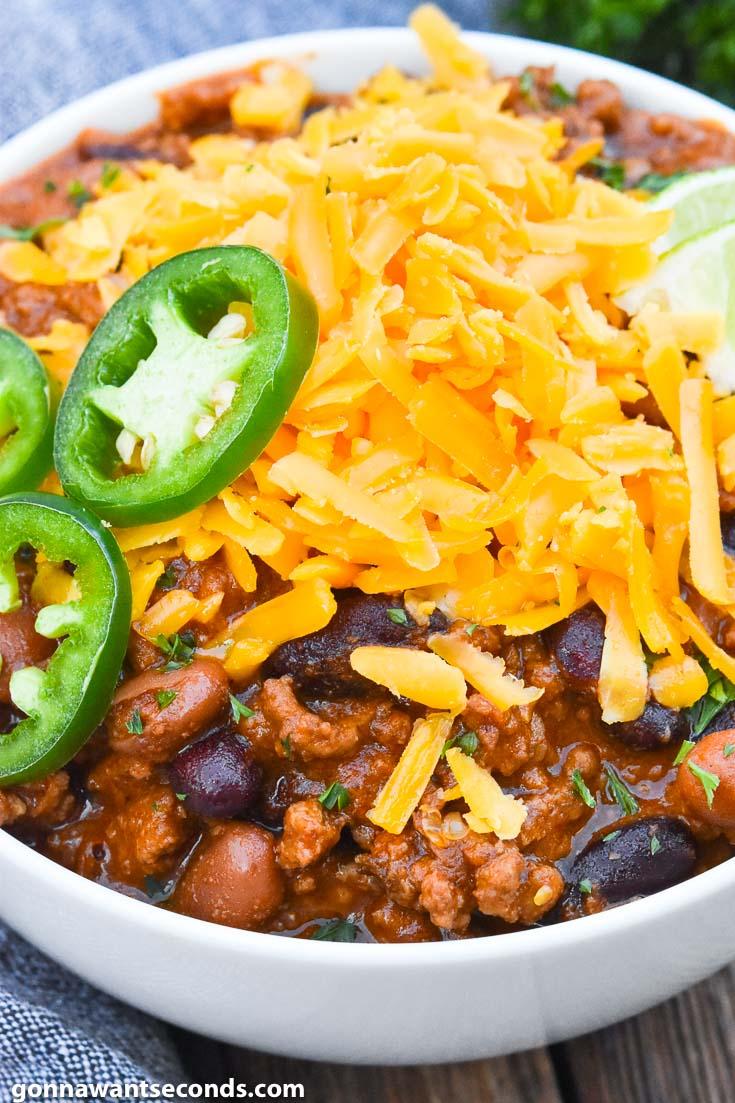 bowl of Pioneer Woman's chili with toppings