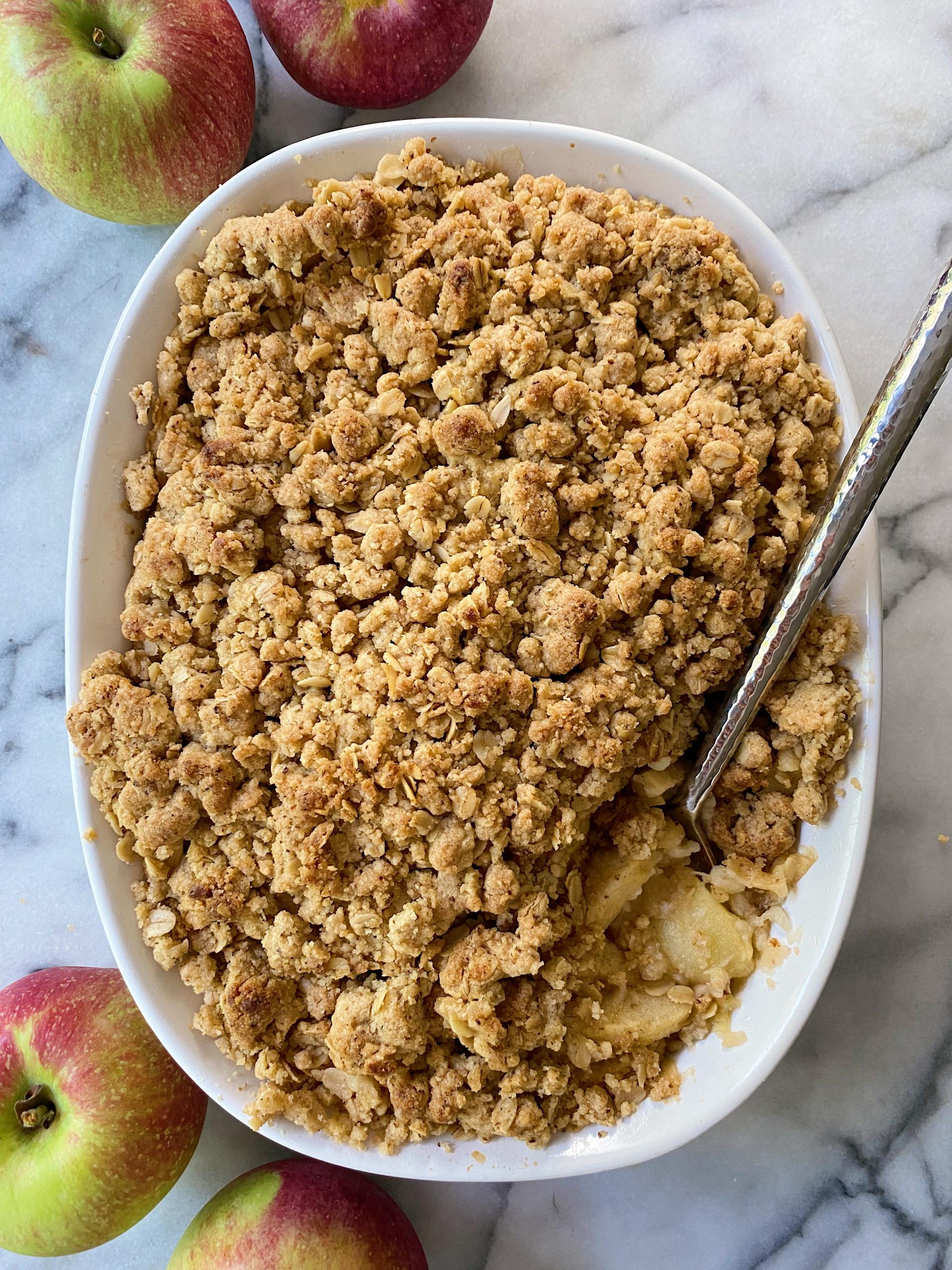 grandmother serving apple crisp